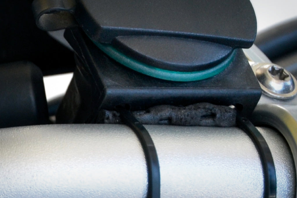 Socket bracket for motorcycle electrical socket