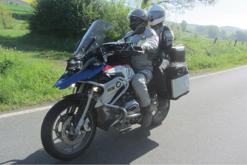 Passenger footrest relocation